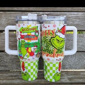 2 green and white grinch tumblers